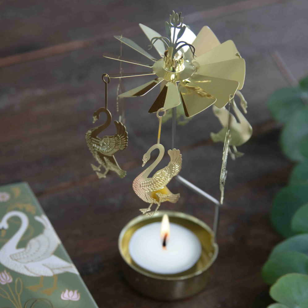 Pluto theelicht carrousel - Met zwanen